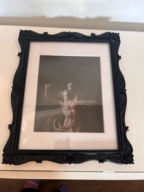 Beautiful black	detailed frame with art picture